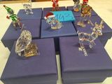 many glass figurines of different shapes and sizes