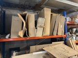 a lot of boxes and boxes on a shelf in a room