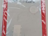 a red plastic package with a white label on it