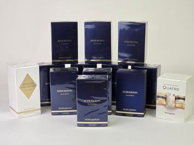 plusieurs types de parfums et de coffrets disposés sur une surface blanche