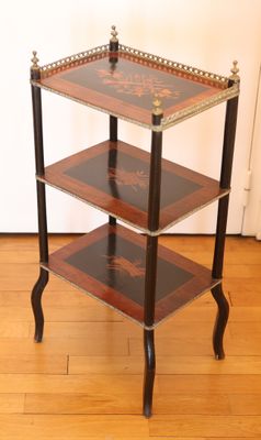 an image of a three tiered table with a wooden top
