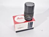 a close up of a camera lens sitting on top of a box