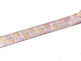 a silver and gold bracelet with a metal clasp on a white background