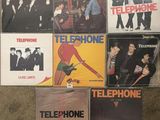 a lot of different types of vinyl records on the floor