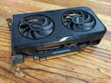 a close up of a video card on a wooden table