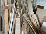 a pile of wood sitting on a table in a room
