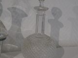 a lot of glass items sitting on a white surface