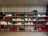 many boxes and boxes on the shelves in the room