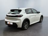 the rear end of a white toyota c - hr parked in a room