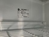 an image of a freezer with a label on the door