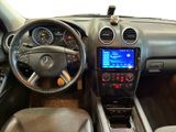 a picture of a car dashboard with a steering wheel