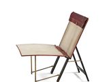 an image of a lounge chair with a table underneath it