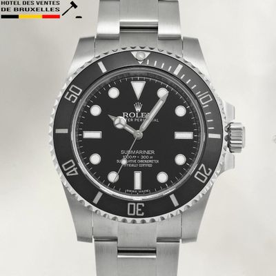 rolex submarine watch with black dial and stainless steel bracelet