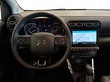 the interior of a car with a steering wheel, dashboard, and dash board