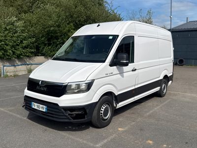 a white van that is parked in a parking lot