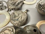 a lot of silver items that are on a table