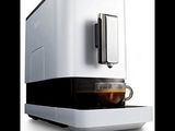 an image of a coffee machine with a cup in it