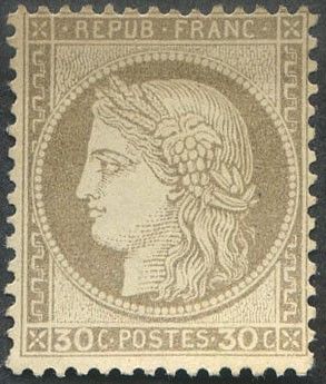 a stamp with a woman ' s face on it