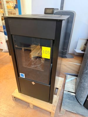 a black cabinet with a glass door in the middle of a room