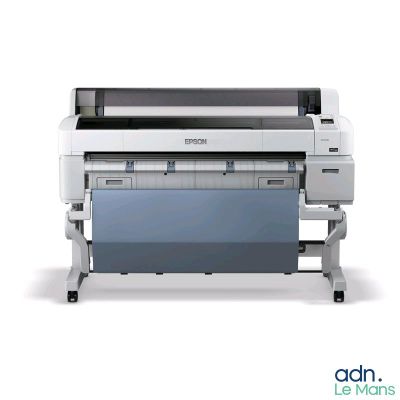 a large format printer sitting on top of a white surface