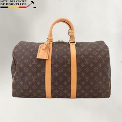 louis vuitton keepall bag in monogram canvas and leather