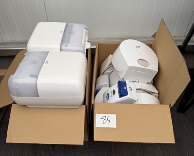 two boxes that have a lot of items inside of them
