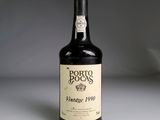 a bottle of wine that is sitting on a table
