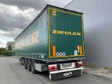 a truck that is parked on the side of the road