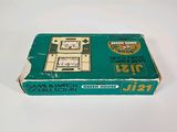 an old green box with a picture of a cell phone on top of it