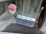 a close up of a military vehicle with a red light on it