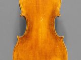 an old violin with a wooden back and a long neck