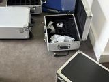 a room that has a bunch of suitcases on the floor