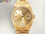 an image of a gold rolex watch with diamonds on the dial