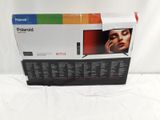 the box is open to show the contents of the new polaroid