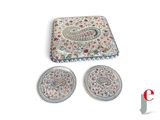 an image of a set of three coasters with a paisley design on them
