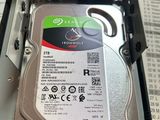 a hard drive in the open box on the table