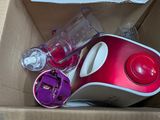 a box with a blender and other items inside of it