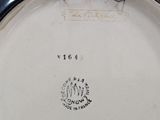 an image of a close up of a plate on a table