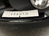 a close up of a sticker on the bumper of a car