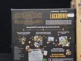 a box with a game inside of it on a black surface