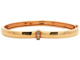 an image of a gold bang bracelet with diamonds
