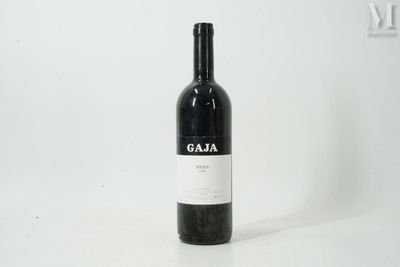 a bottle of wine that is sitting on a table