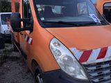 an orange van that is parked in a parking lot