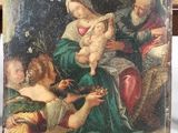 une image d'une peinture représentant une femme tenant un bébé sur ses genoux