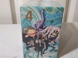 the box has a picture of a group of anime characters on it