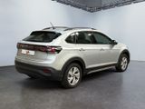 the rear end of a silver volkswagen suv parked in a garage