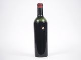 a bottle of wine that is sitting on a table
