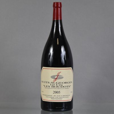 a bottle of wine that is sitting on a table