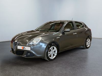 a picture of a car that is parked in a showroom