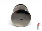 an image of a small metal object on a white surface